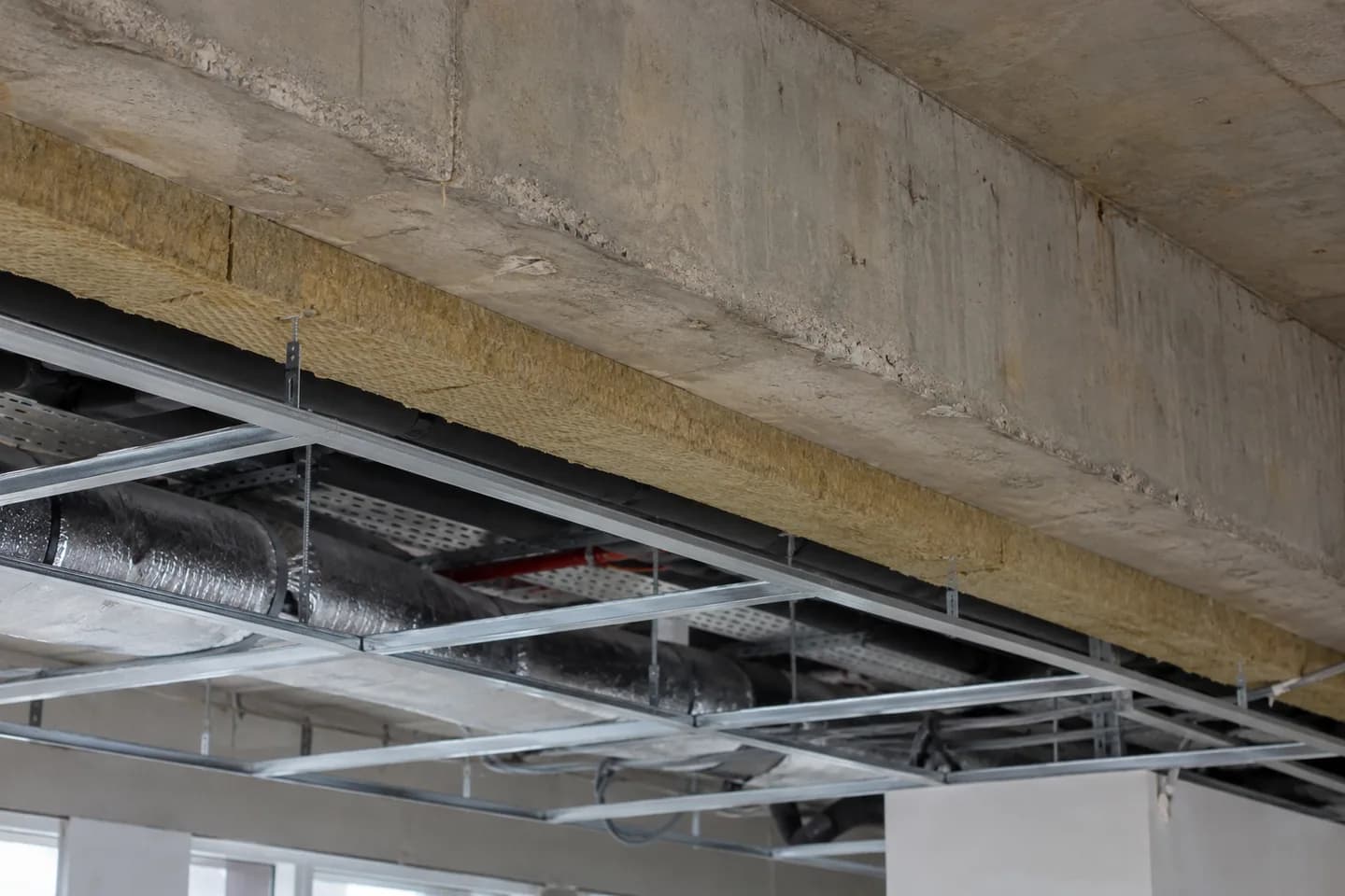 Commercial floor slab and suspended ceiling at construction stage