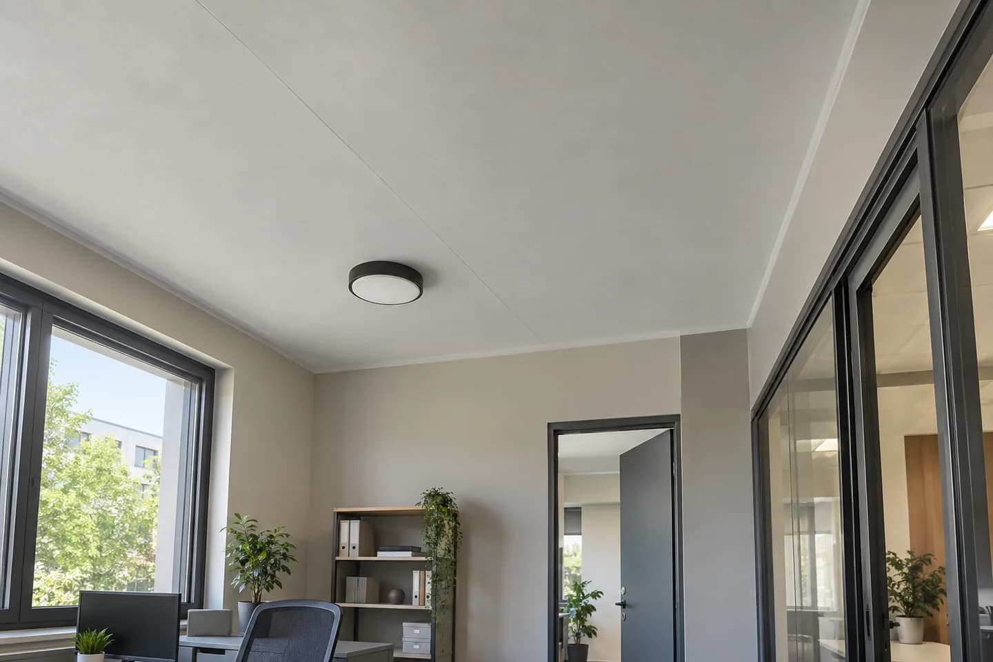 Lower tenant room showing ceiling and partition junctions