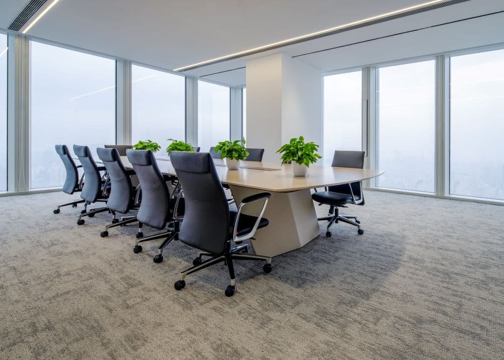 UNIJOY carpeted meeting room used as visual context for retaining a future replacement record