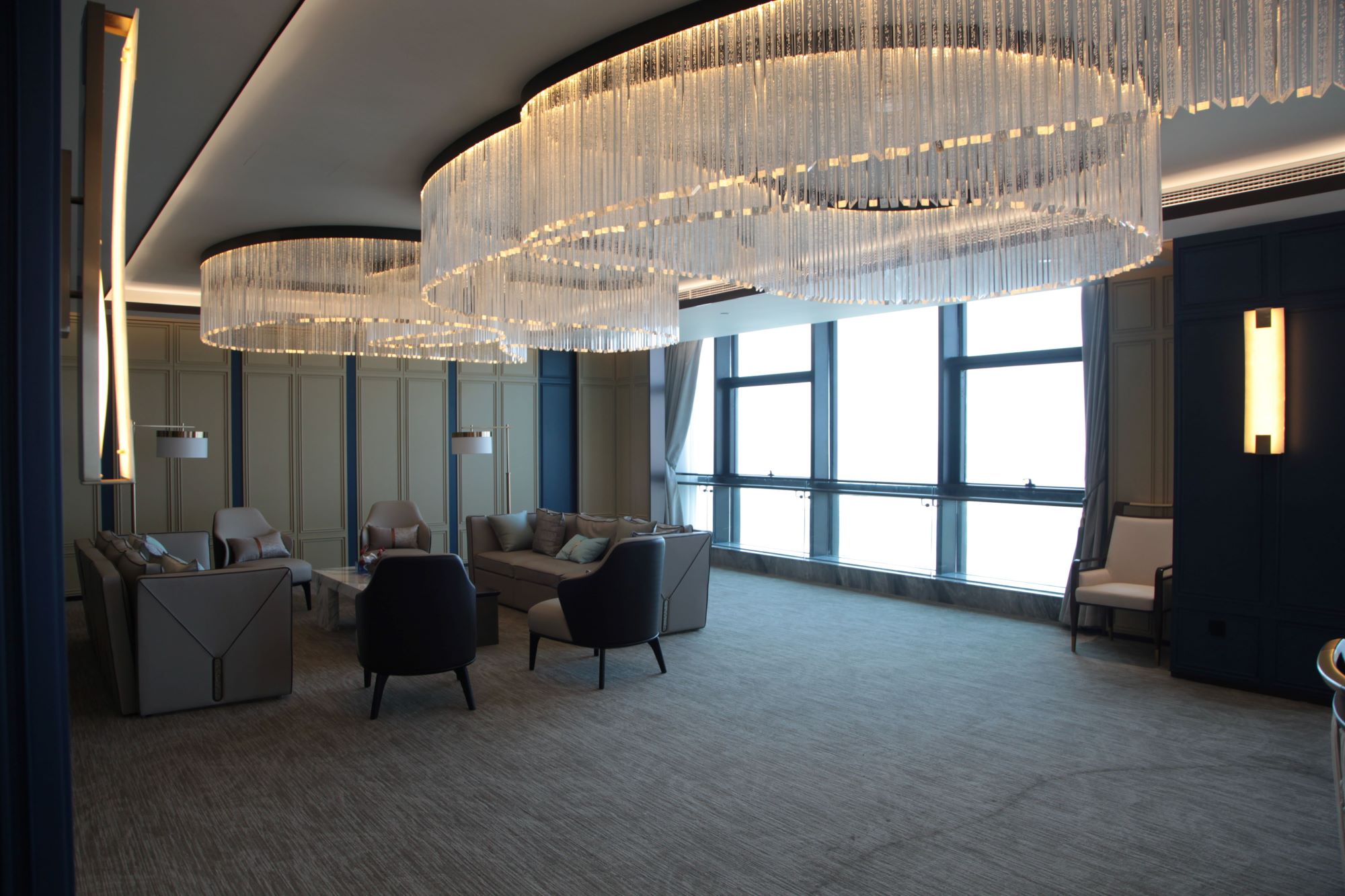 UNIJOY carpeted lounge used as visual context for keeping a zone map and retained sample with spare tiles